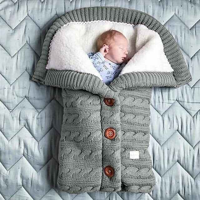 Sleeping bag knitted blanket for the stroller and bed